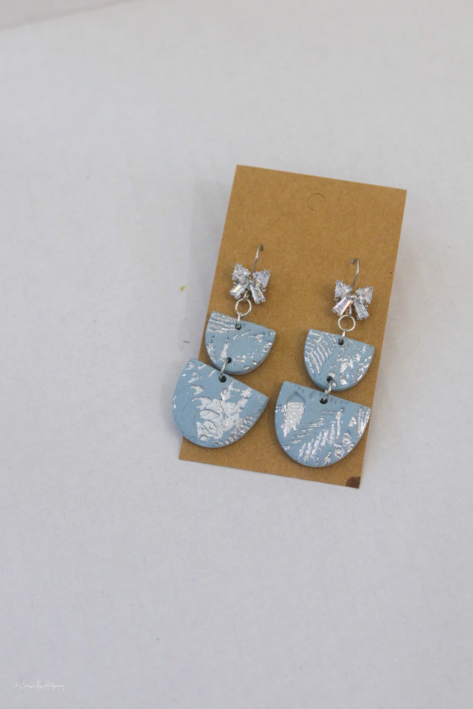 Light blue silver bow sparkle dangle earrings