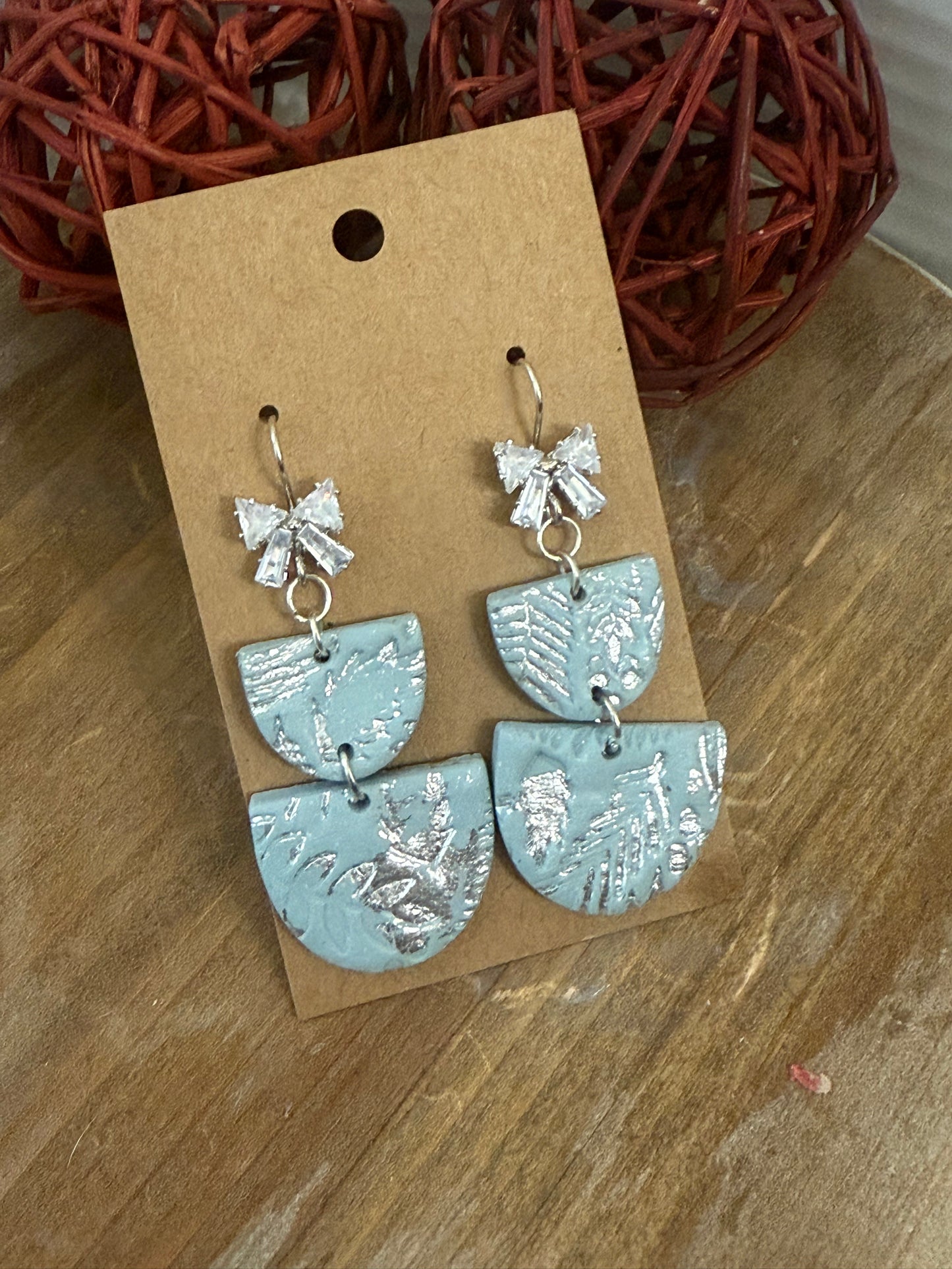 Light blue silver bow sparkle dangle earrings
