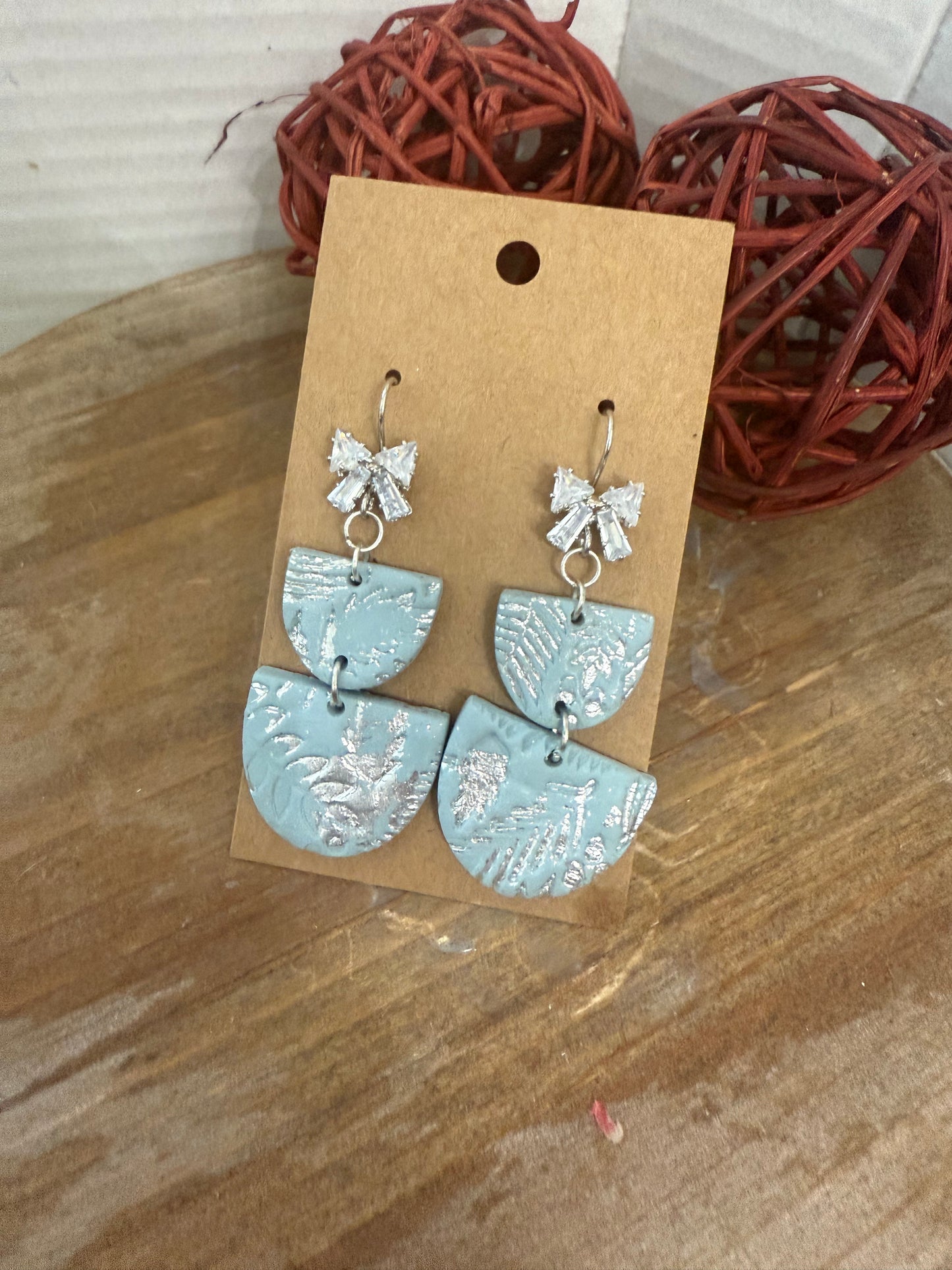 Light blue silver bow sparkle dangle earrings